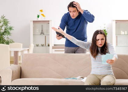 Young couple in budget planning concept 