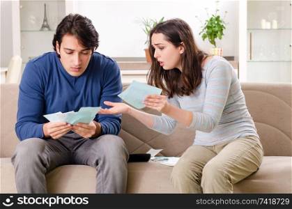 Young couple in budget planning concept 
