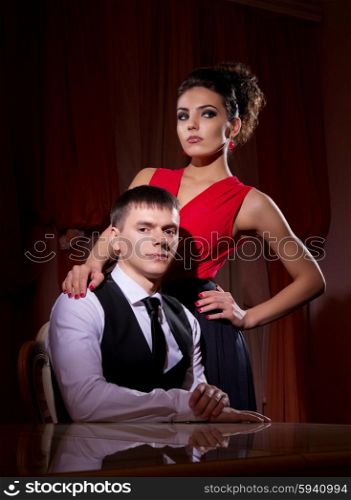 Young couple in dark room