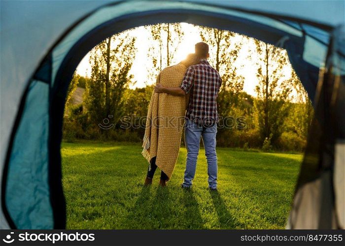 Young couple in love after waking up in the nature
