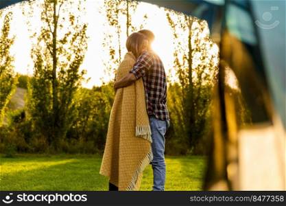 Young couple in love after waking up in the nature