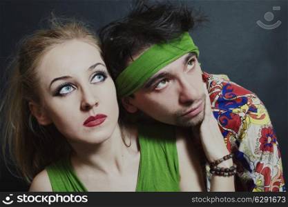 young couple in love on a black background