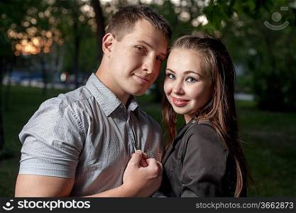 Young couple in love side view