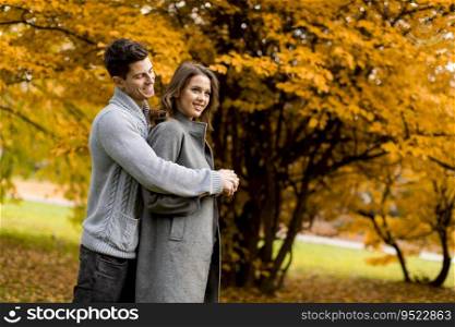 Young couple in love walking together in the park