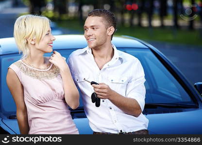 Young couple in love with the car keys