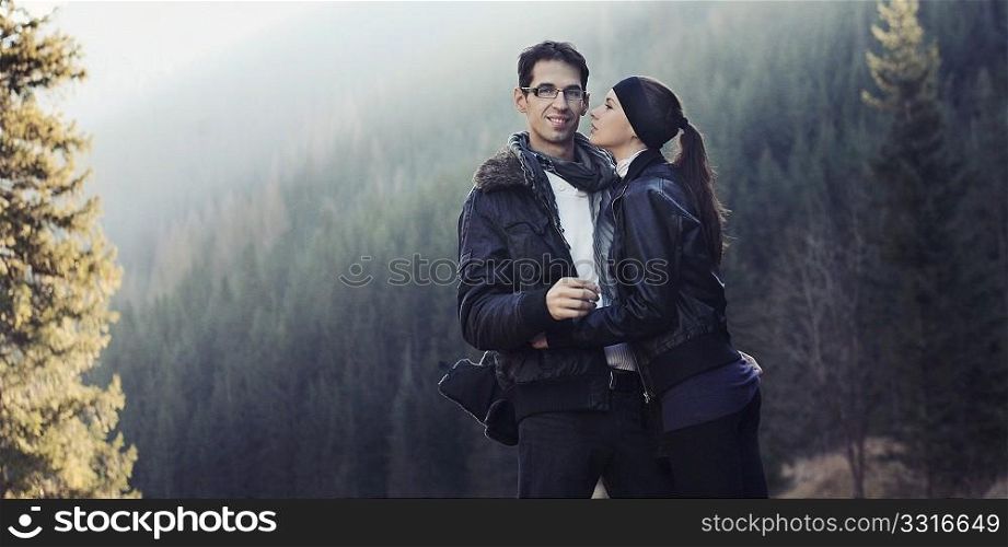 Young couple in nature scenery