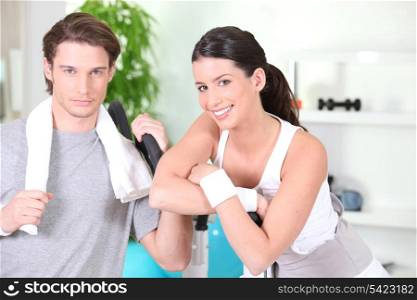 young couple in sports room