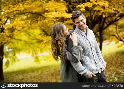 Young couple in the autumn park