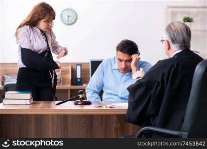 Young couple in the courthouse in divorce concept  