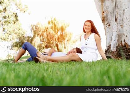 Young couple in the park. Young couple in the park in the summer