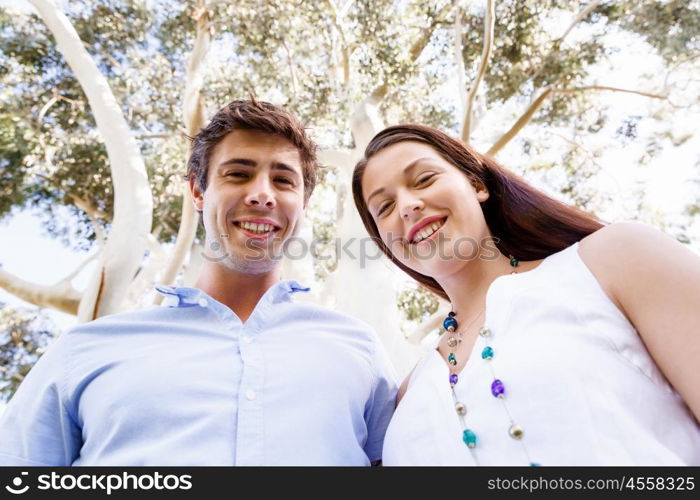 Young couple in the park. Young happy couple in the park in the summer