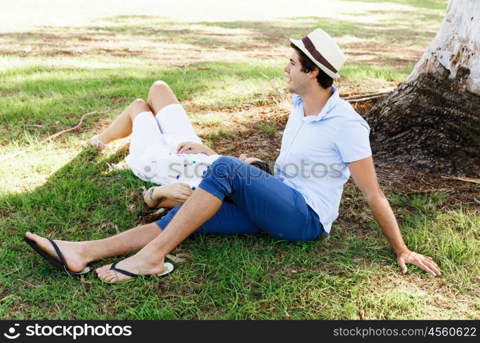 Young couple in the park. Young happy couple in the park in the summer