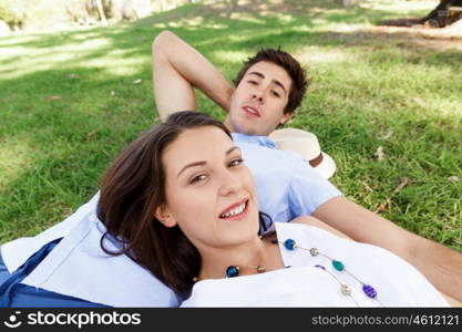 Young couple in the park. Young happy couple in the park in the summer