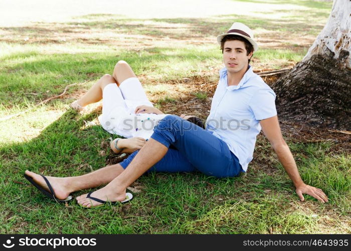 Young couple in the park. Young happy couple in the park in the summer