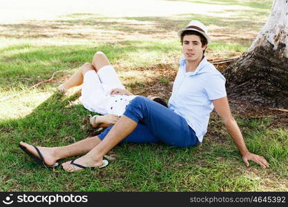 Young couple in the park. Young happy couple in the park in the summer