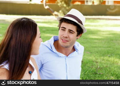 Young couple in the park. Young happy couple in the park in the summer