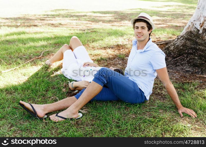 Young couple in the park. Young happy couple in the park in the summer