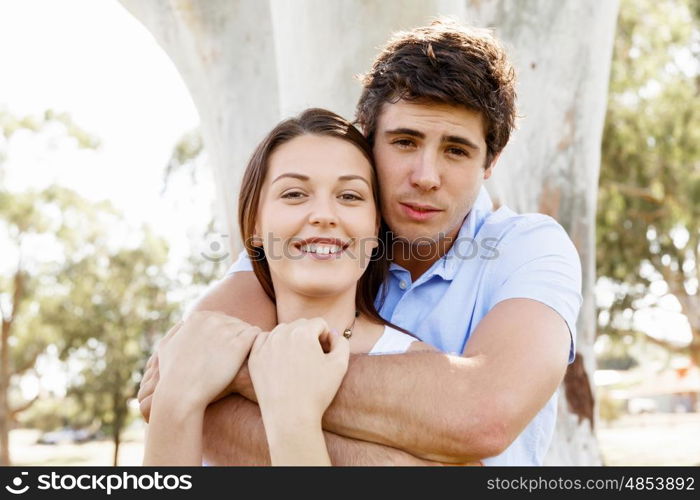 Young couple in the park. Young happy couple in the park in the summer