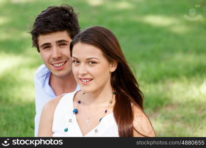 Young couple in the park. Young happy couple in the park in the summer