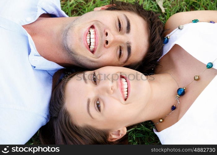 Young couple in the park. Young happy couple in the park in the summer