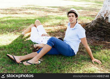 Young couple in the park. Young happy couple in the park in the summer