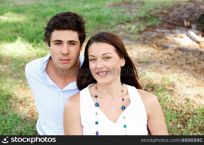 Young couple in the park. Young happy couple in the park in the summer