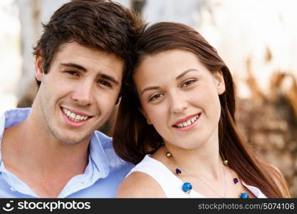 Young couple in the park. Young happy couple in the park in the summer