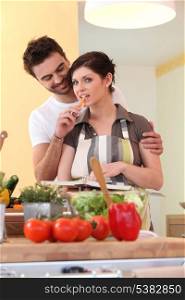 Young couple in their kitchen