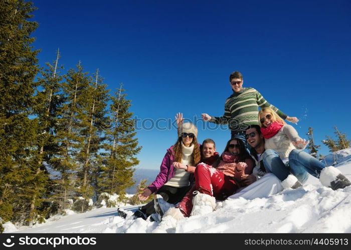 Young Couple In winter Snow Scene at beautiful sunny day