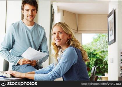Young Couple Looking at Documents