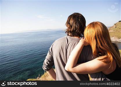 Young couple looking at horizon