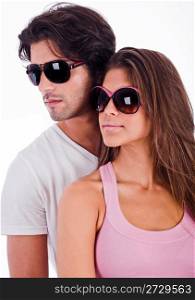 young couple looking right side view with sunglasses