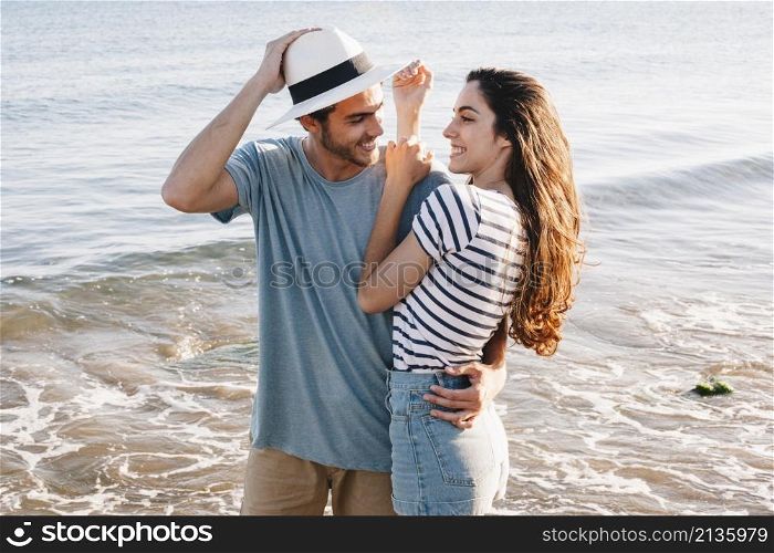 young couple love beach