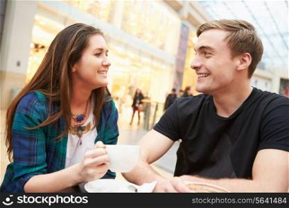 Young Couple Meeting On Date In Cafe