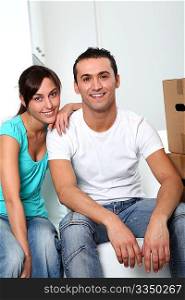 Young couple moving in new place