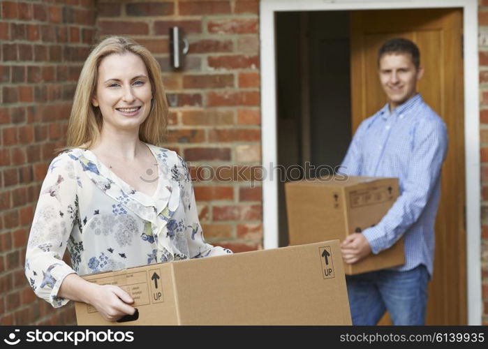 Young Couple Moving Into New Home Together