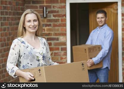 Young Couple Moving Into New Home Together