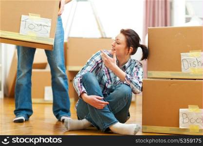 Young couple moving to new house