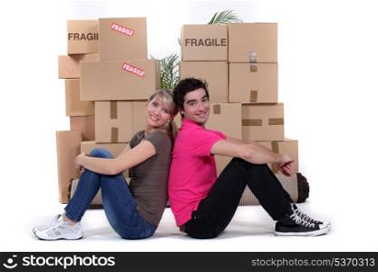 young couple moving together
