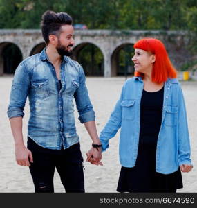 Young couple of lovers embracing . Young couple of lovers embracing in the park