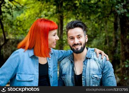 Young couple of lovers relaxed in the park