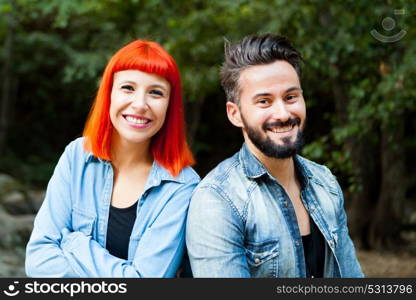 Young couple of lovers relaxed in the park