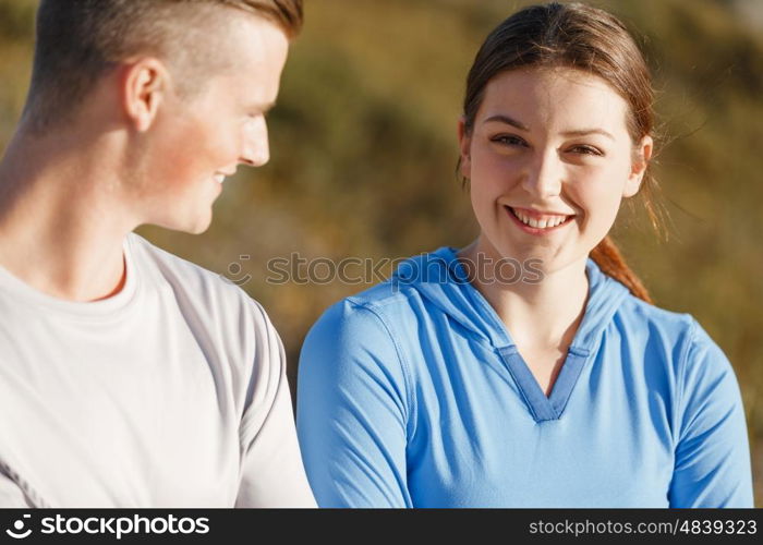 Young couple on beach training together. Young couple on beach training and exercising together