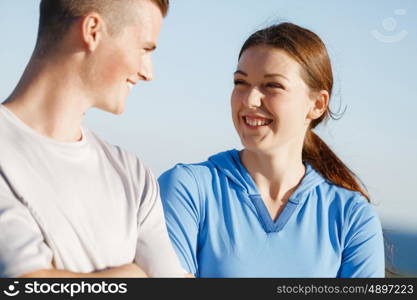 Young couple on beach training together. Young couple on beach training and exercising together