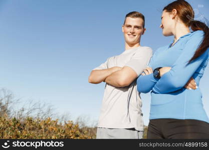 Young couple on beach training together. Young couple on beach training and exercising together