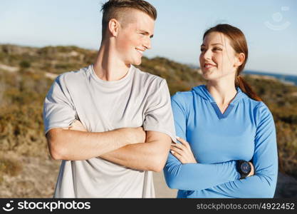 Young couple on beach training together. Young couple on beach training and exercising together