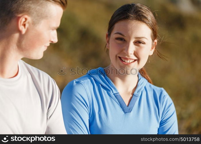 Young couple on beach training together. Young couple on beach training and exercising together