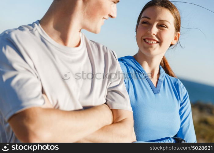 Young couple on beach training together. Young couple on beach training and exercising together