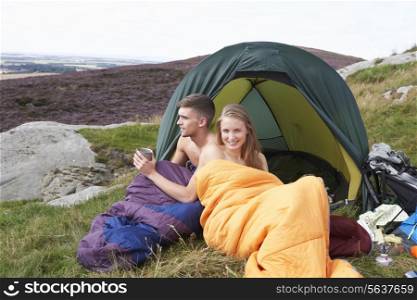 Young Couple On Camping Trip In Countryside