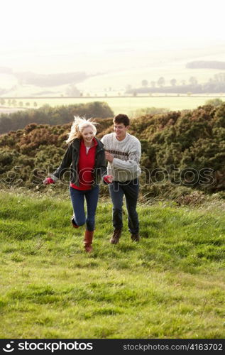 Young couple on country walk